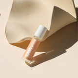 'Free Spirit' perfume roller on a white background